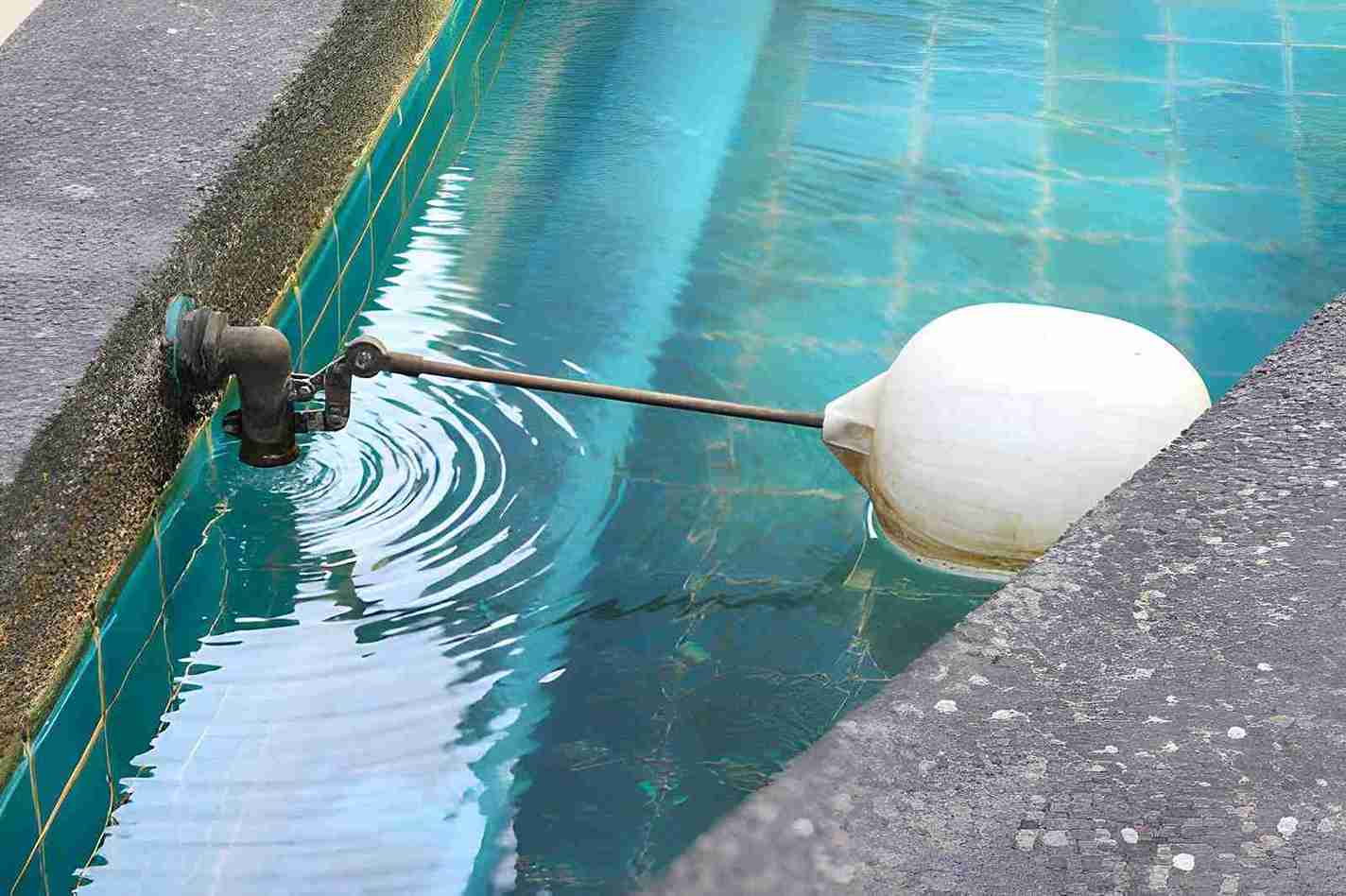 Pool remodeling Hobe Sound float valve system with turquoise tile tank regulating water level